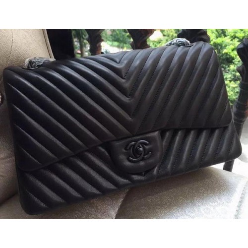 Geantă Chanel Classic Flap, piele de oaie neagră, matlasată cu chevron, A1113 argintie